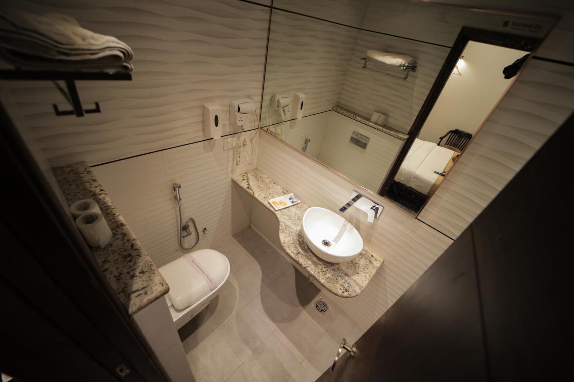 Hotel Stay Well Dx Nuova Delhi Esterno foto