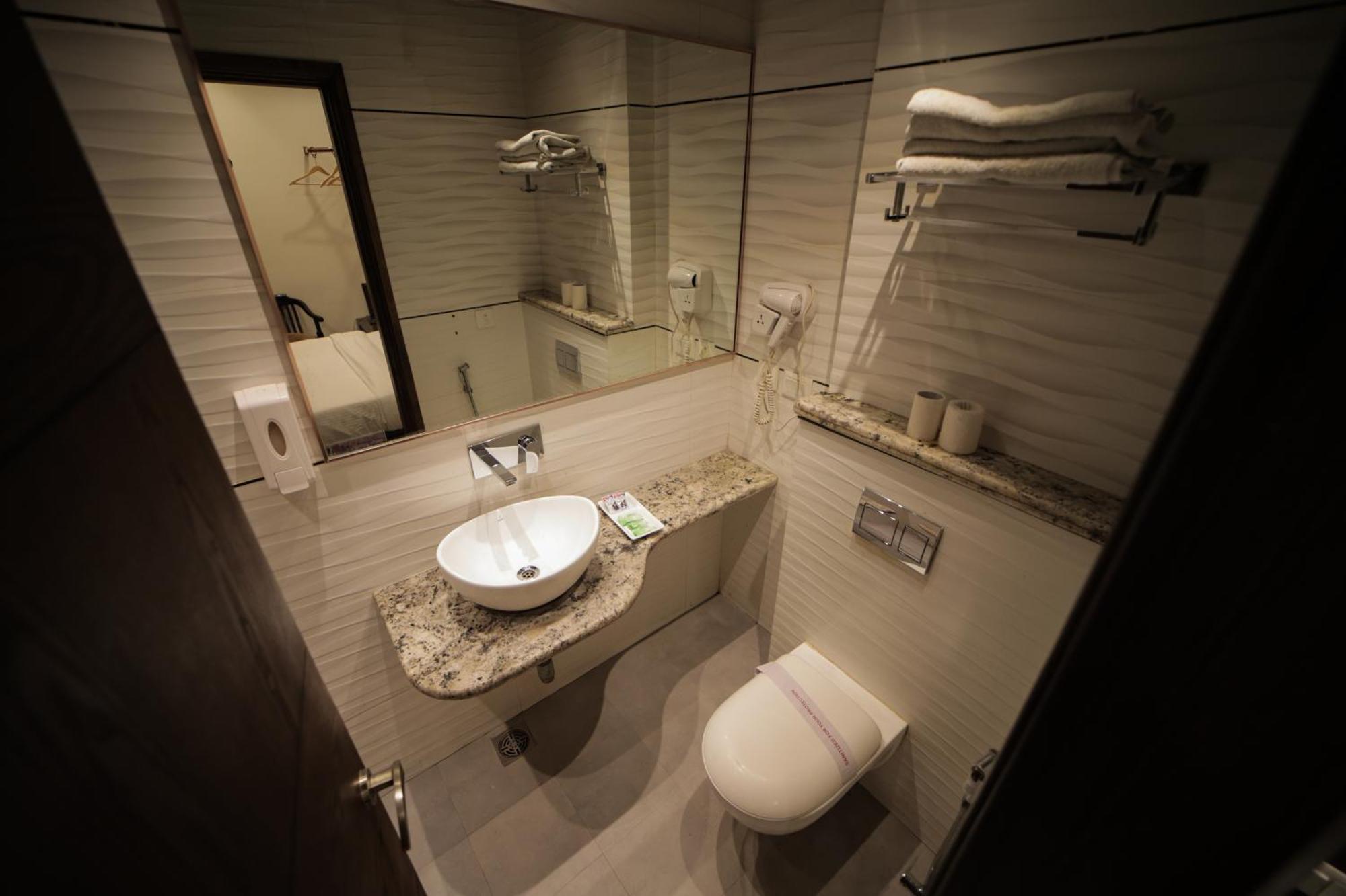 Hotel Stay Well Dx Nuova Delhi Esterno foto